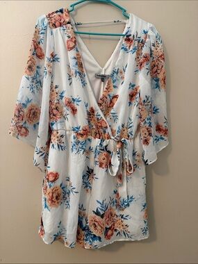 Charlotte Russe White Floral Wrap Romper with Blue and Peach Roses